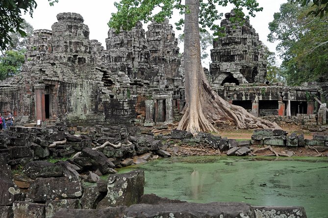 Private Tuk Tuk Tour to Angkor Wat and Small Circle with Two Extras - Angkor Thom’s gates and Bayon: photo stops that still add up