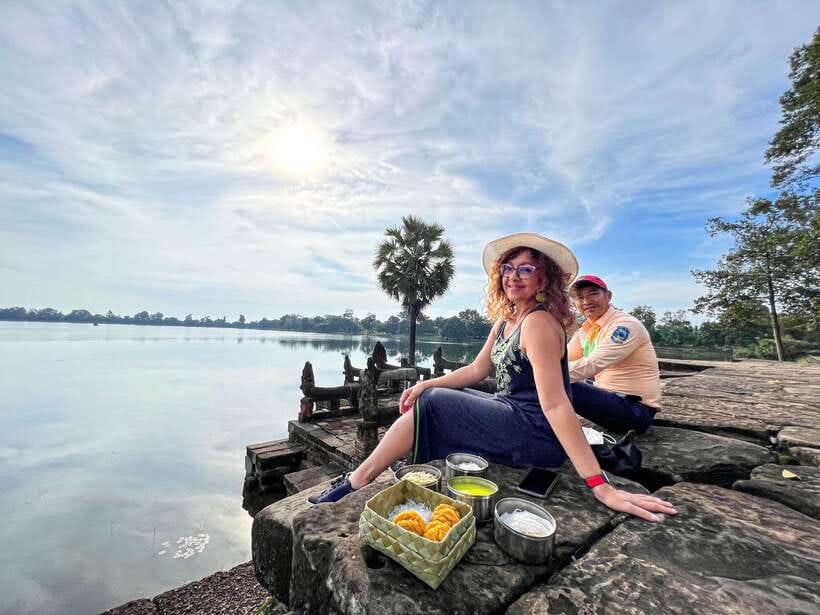 Siem Reap: Angkor Wat Sunrise Tour via Tuk Tuk & Breakfast - Bayon and Victory Gate: the smile faces, plus context