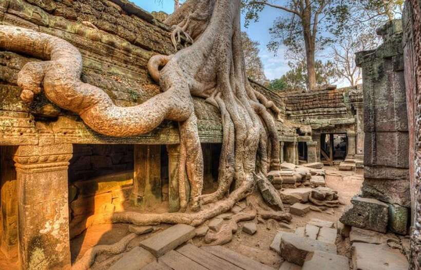Siem Reap: Full-Day Tuk-Tuk Tour of Angkor Wat Temples - Bayon next: energy shifts from grand to intimate