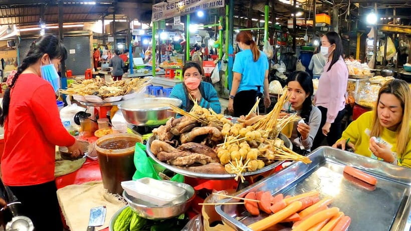 Siem Reap Street Foods Tour by Tuk Tuk with Personal Guide - Stop 1: Preah Ang Chek and Preah Ang Chorm shrine photo + street snacks