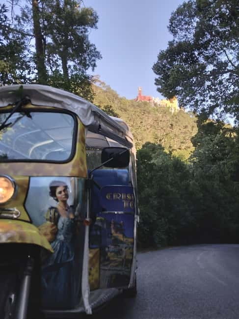 Sintra Tour: Palaces and Dream Landscapes in Tuk Tuk - Moorish Castle walls: medieval stone plus Atlantic-sized views