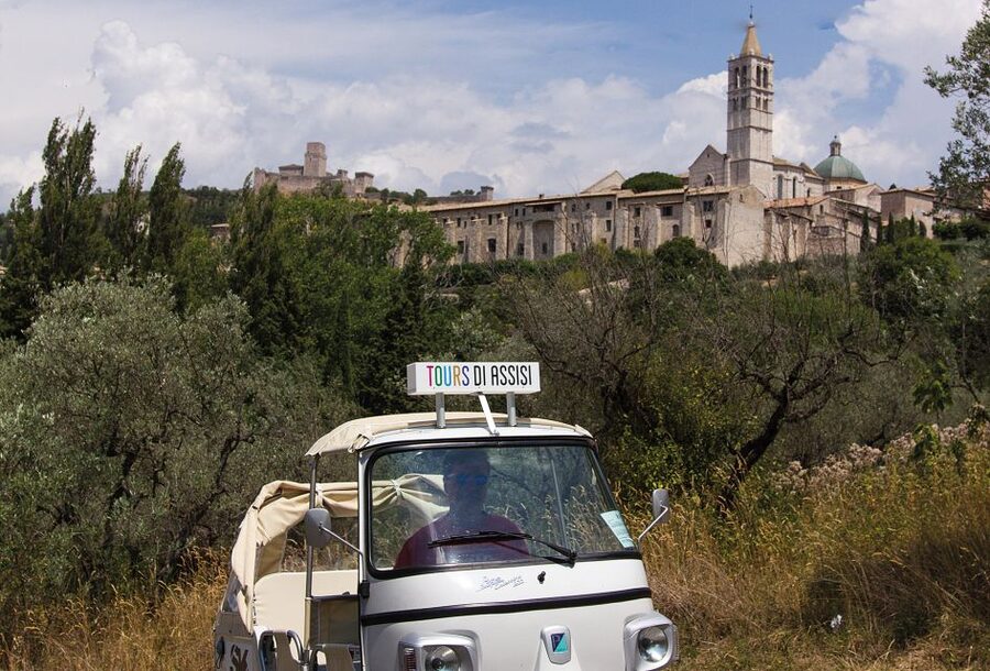 The Life of Saint Francis Tour by Tuk Tuk: English & Spanish - Piazza Matteotti and San Rufino Cathedral: Roman ruins meet a baptism moment