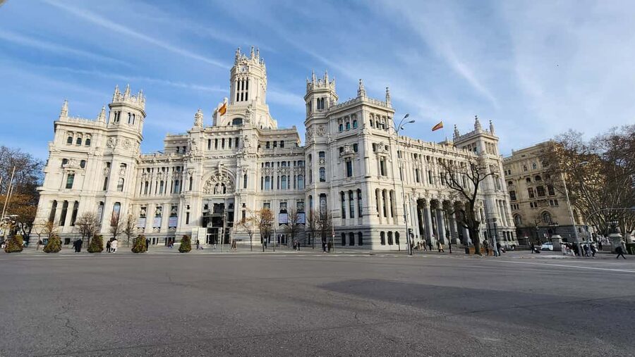 Tour Madrid: Secrets in a Electric Tuk Tuk - Puerta del Sol: the city symbol stop, not just another busy square