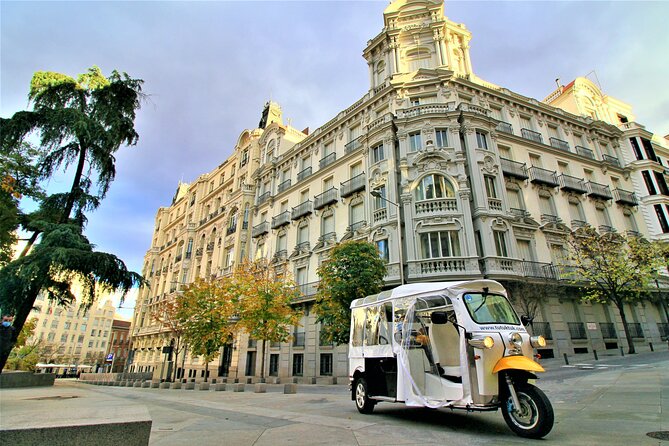 Tour of Historic and Modern Madrid with a guide in a yellow tuk tuk - Starting in Centro: Plaza de Isabel II as a good launch pad