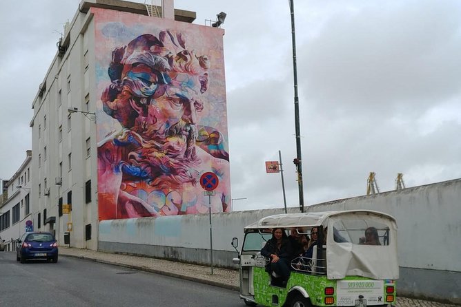 Tuk Tuk Lisbon: Exploring Urban Art - Travessa das Merceeiras: Vhils (Alexandre Farto) in hidden faces