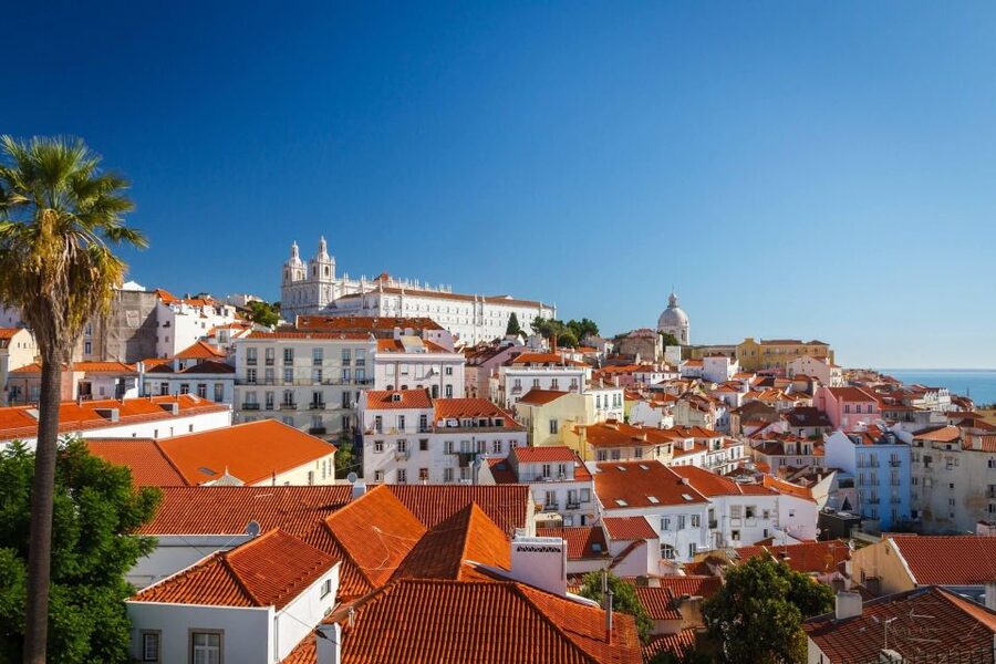 Tuk Tuk Old Lisbon Tour 1,5h - Alfama: narrow lanes, local life, and Fado energy