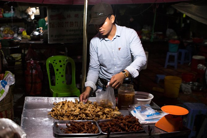 Ultimate Phnom Penh Food Tour by Tuk Tuk: 20 Tastings and Drinks - Stop 2: Wat Botum Park family shop, beer-cold classic bites