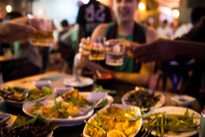 Ultimate Phnom Penh Food Tour by Tuk Tuk: 20 Tastings and Drinks - Stop 5: Wat Phnom dinner feast with live music and free-flow beer