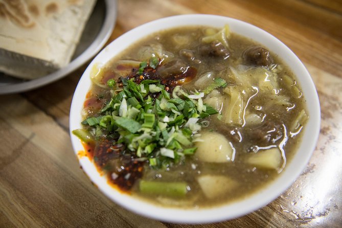 Xi'an Evening Food Tour by TukTuk - The in-between stops: a mix of family specialties, not buffet sampling
