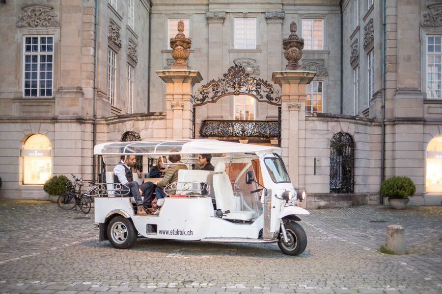 Zurich: Swiss Cheese Fondue and Wine e-Tuk-Tuk Tour - The ride starts near the Weekday store, then turns into a real local loop